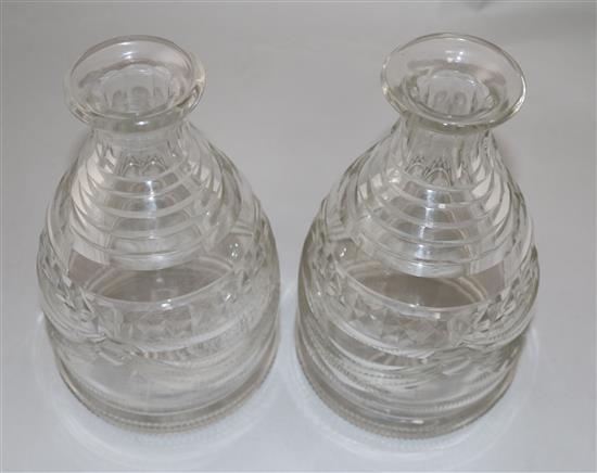 A pair of Regency Irish cut glass mallet form decanters and stoppers, height 25cm